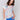 White floral top with crew neckline and side tie detail by Charlie B.