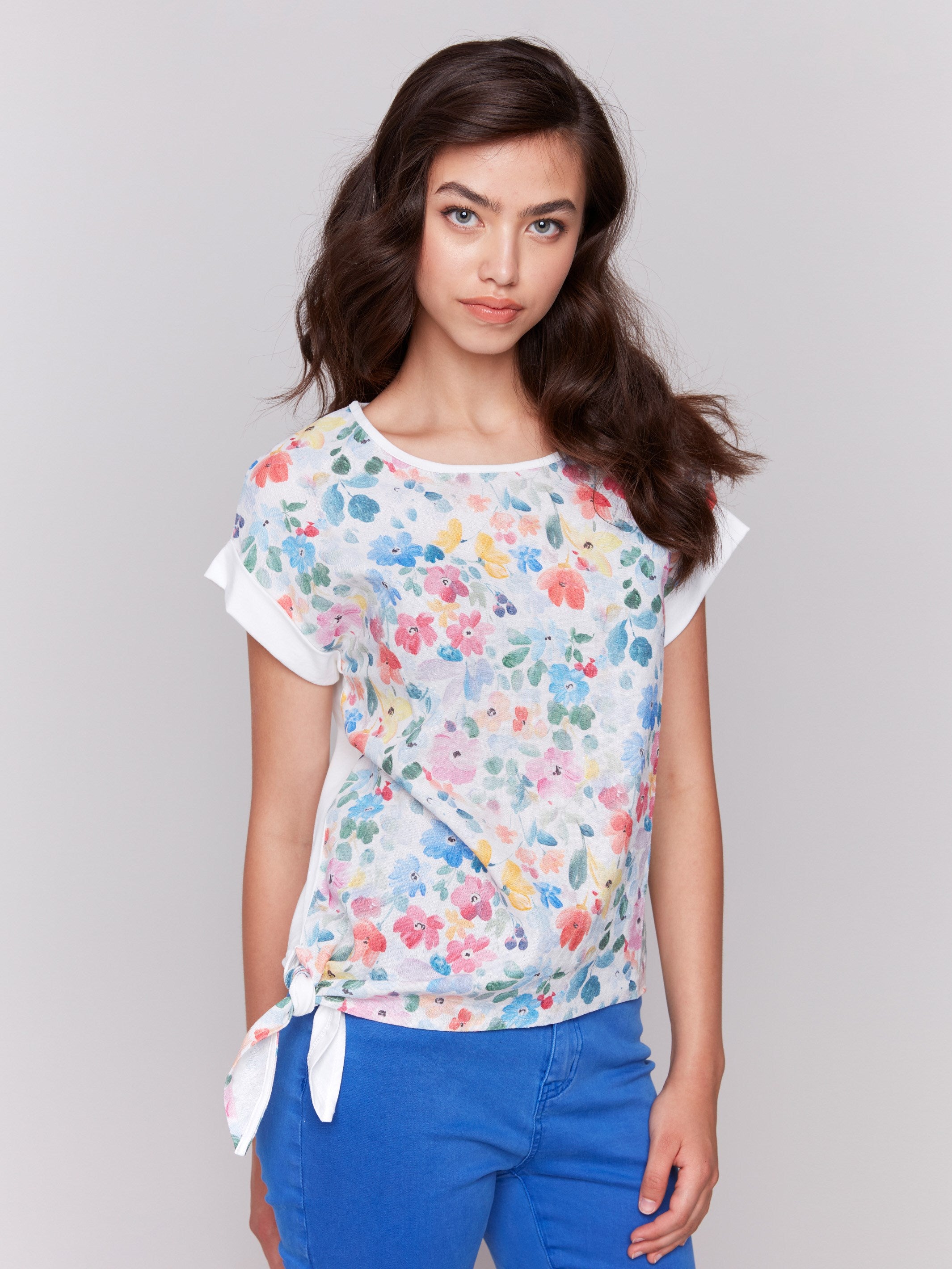 Chic white floral top with elegant short dolman sleeves by Charlie B.