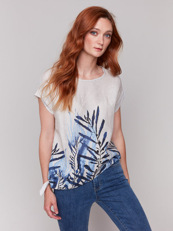 Stylish top featuring a side tie detail in palm print by Charlie B.