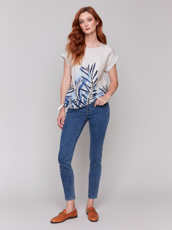 Chic palm print enhances this versatile, lightweight blouse by Charlie B.