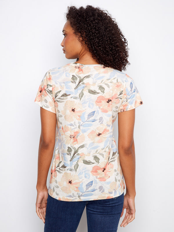 A versatile V-neck top with a charming floral print for everyday wear by Charlie B.