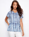 Blue and white patterned top with a stylish V-neck, offering a modern look. Perfect for casual outings by Charlie B.