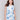 Linen vest with a lapel collar, showcasing intricate floral patterns by Charlie B.