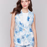 Linen vest with a lapel collar, showcasing intricate floral patterns by Charlie B.