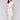 White pants with a wide leg design and smocked waistband, perfect for summer by Charlie B.