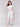 Stylish white trousers offering comfort and flair, highlighted by a unique border print by Charlie B.
