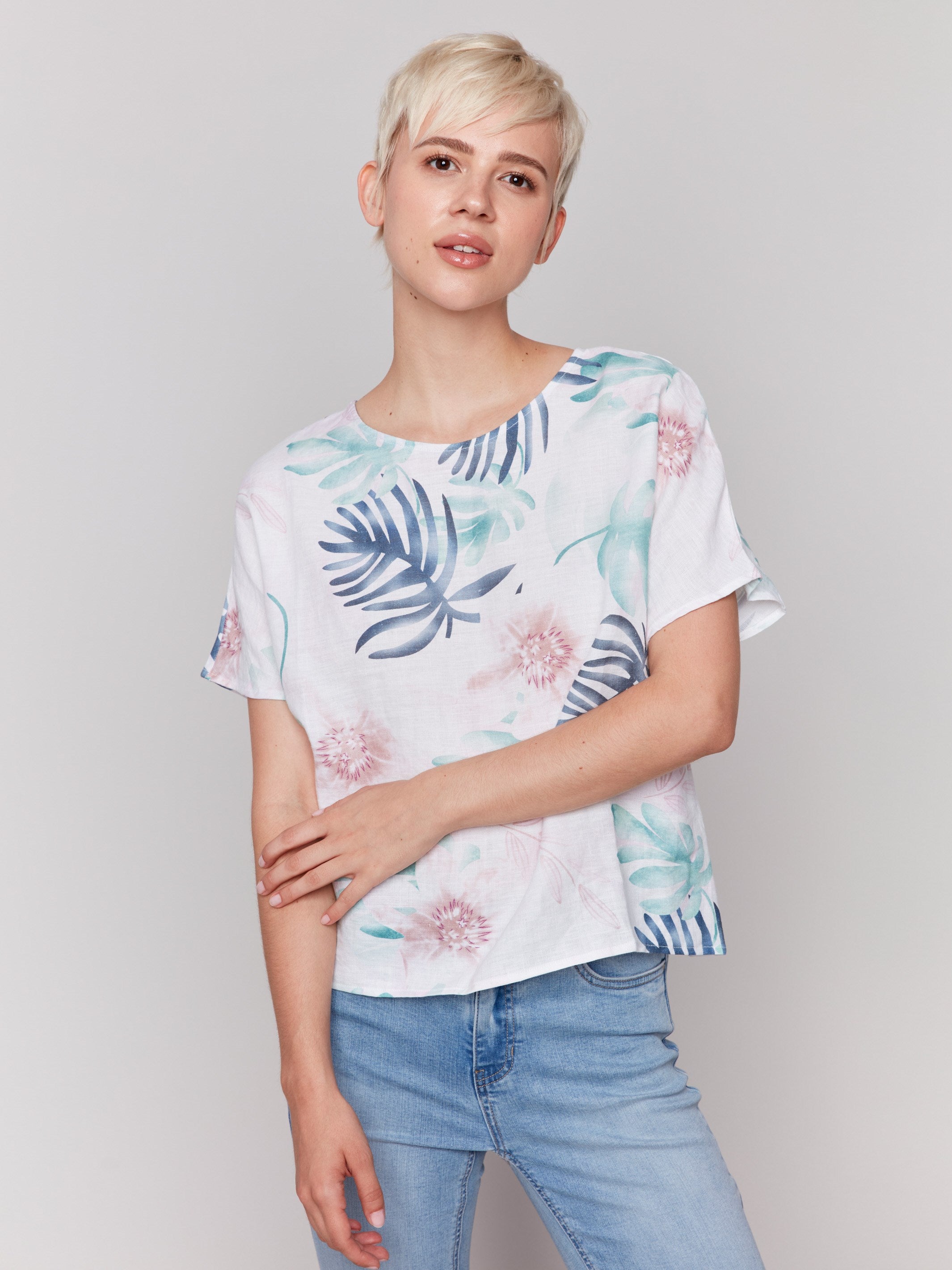 Elegant 100% linen top showcasing a lush botanical print by Charlie B.