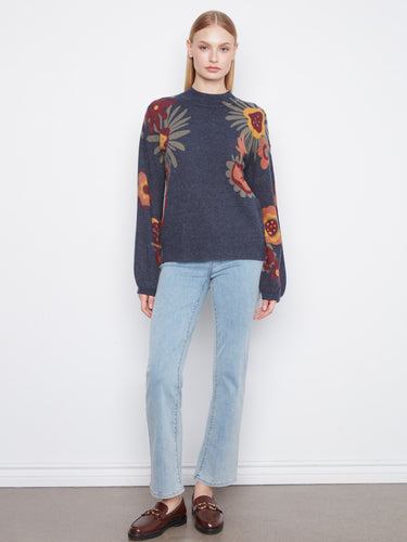Floral patterned navy sweater highlighting the stylish drop shoulder design and comfortable fit by Charlie B.