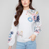 Light grey sweater featuring a mock neck with delicate floral patterns for a chic look by Charlie B.