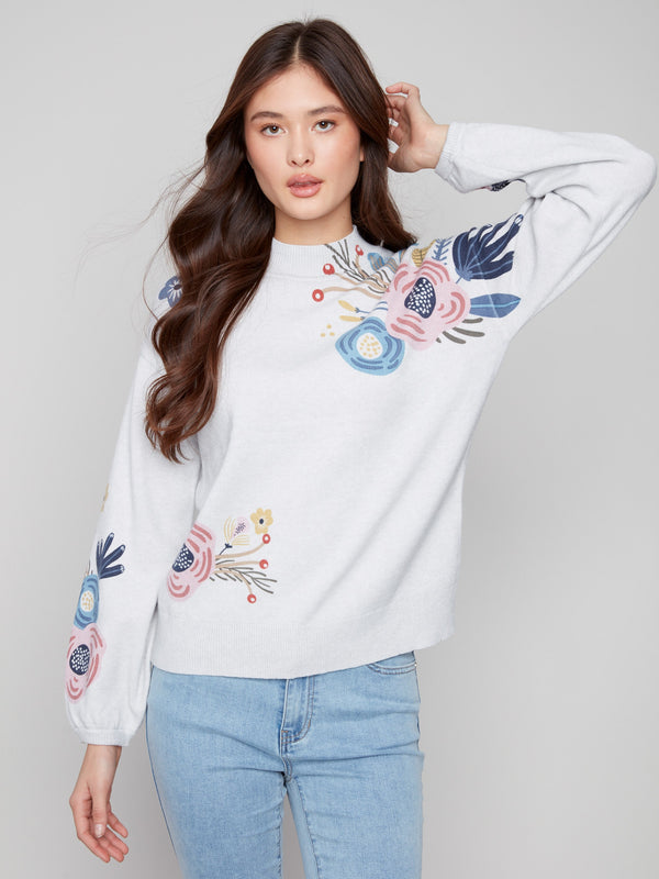 Sweater in soft heather grey with charming elastic cuffs and vibrant floral motifs by Charlie B.