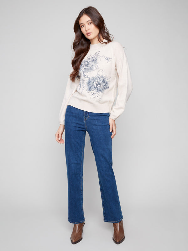 Chic oat-colored sweater with elastic cuffs and a delicate floral print by Charlie B.