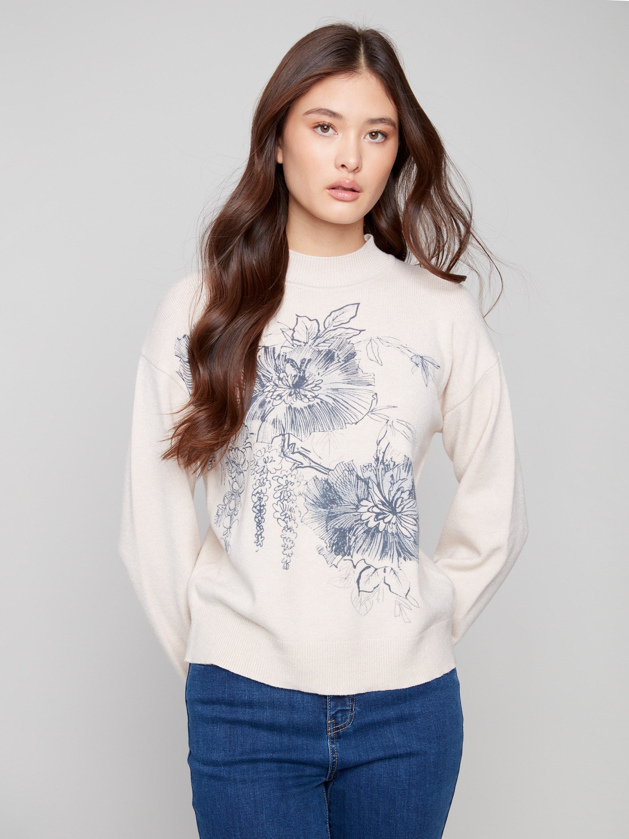 Stylish floral print sweater with mock neck and comfortable long sleeves by Charlie B.