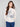 Stylish floral print sweater with mock neck and comfortable long sleeves by Charlie B.