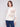 Heather natural sweater showcasing exquisite floral patterns by Charlie B.