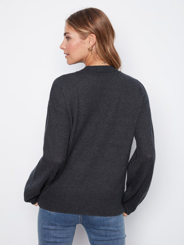 Floral pattern on this cozy sweater brings a burst of color and charm to your wardrobe by Charlie B.