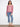 Stylish off-shoulder red blouse featuring elegant balloon sleeves and floral pattern, styled with denim jeans by Charlie B.