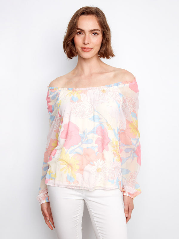 Elegant top with off-the-shoulder neckline and a delicate floral design, perfect for a stylish look by Charlie B.