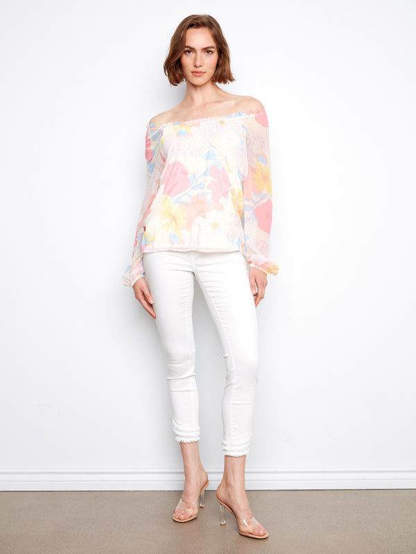 Chic blouse featuring balloon sleeves with elastic cuffs, adding a touch of sophistication by Charlie B.