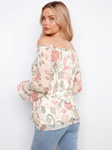 Stylish balloon sleeves on this floral blouse create a playful silhouette, great for any occasion by Charlie B.