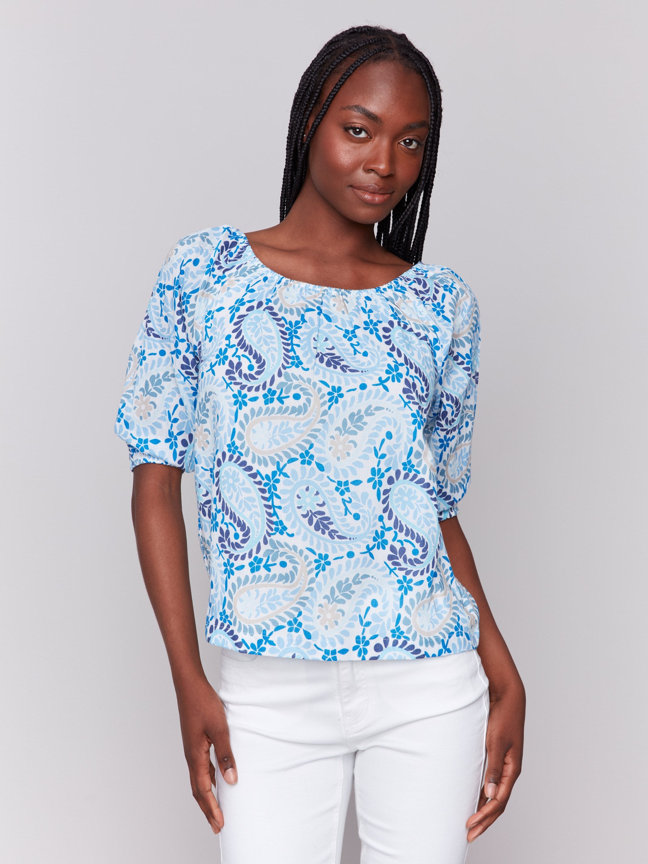 Blue blouse with a round neckline and paisley print, crafted from 100% cotton by Charlie B.
