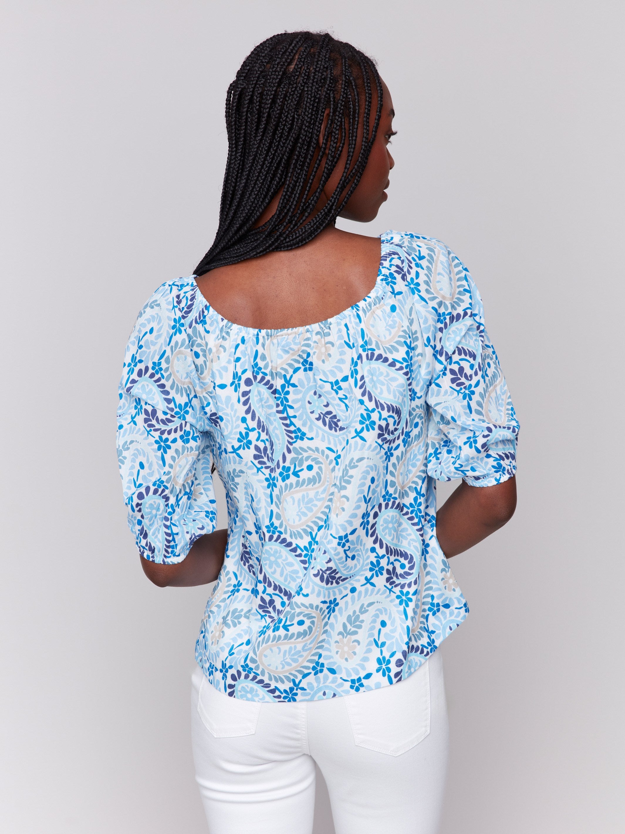 100% cotton blue blouse showcasing an elegant off-the-shoulder design by Charlie B.