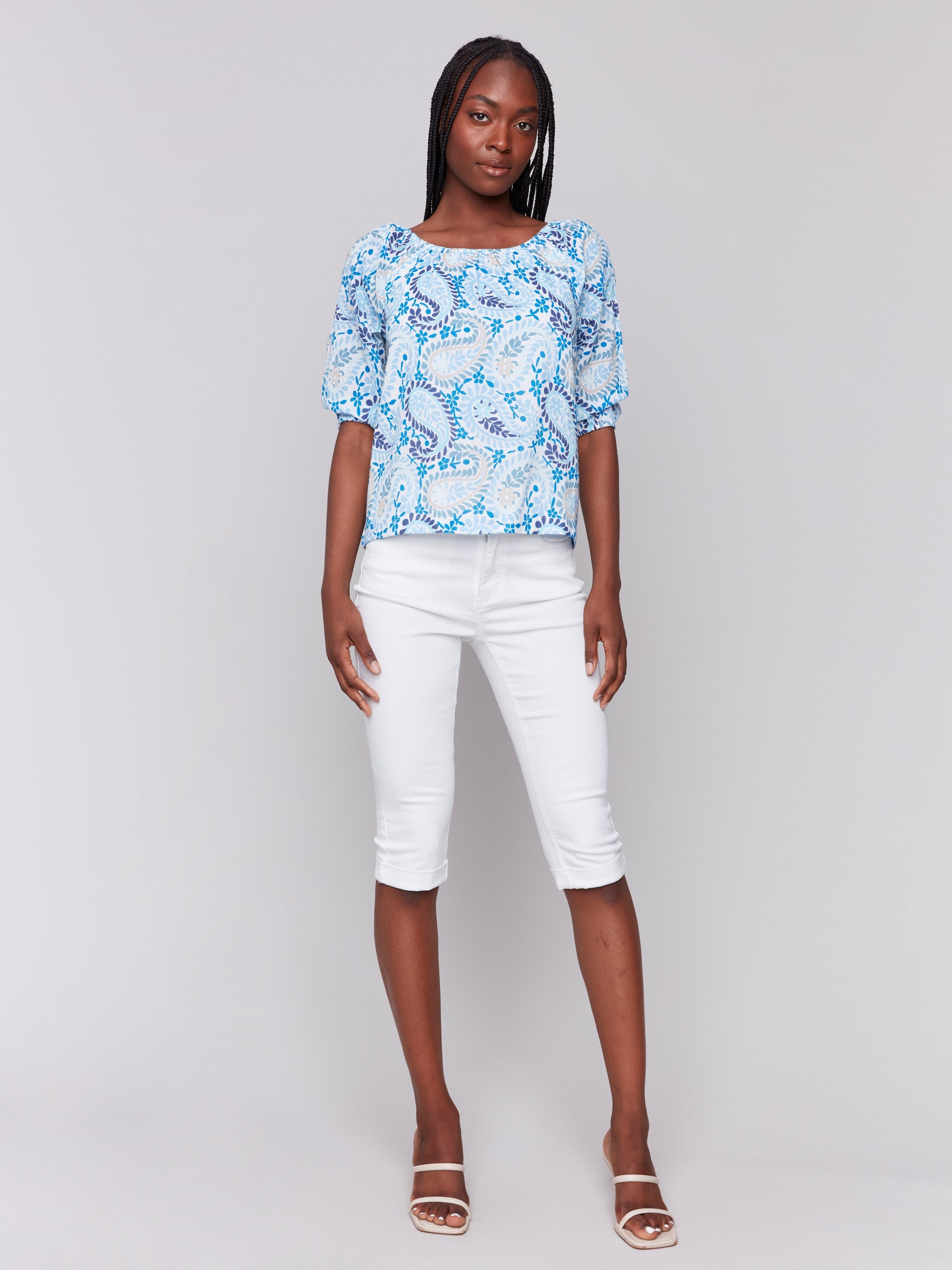 Paisley-patterned blue blouse featuring three-quarter length sleeves by Charlie B.