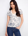 Blue floral print t-shirt featuring a drop shoulder design, made from organic cotton for style and comfort by Charlie B.