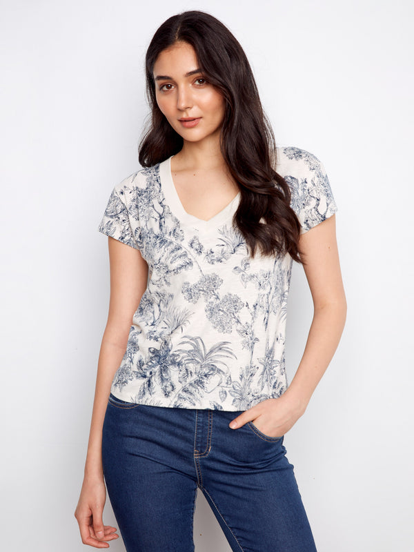 Blue floral print t-shirt featuring a drop shoulder design, made from organic cotton for style and comfort by Charlie B.