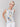 White tank top featuring a crew neckline and feather print by Charlie B.