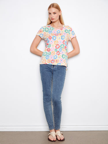 This charming tee features a crew neckline and colorful floral design, made entirely of cotton by Charlie B.