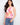 Floral tank top with a vibrant pink, orange, and yellow design featuring a crew neckline for added comfort by Charlie B.
