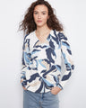 Stylish V-neck sweater with a vibrant pattern, perfect for casual outings. The drop shoulder design adds a relaxed touch by Charlie B.