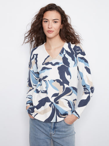 Stylish V-neck sweater with a vibrant pattern, perfect for casual outings. The drop shoulder design adds a relaxed touch by Charlie B.