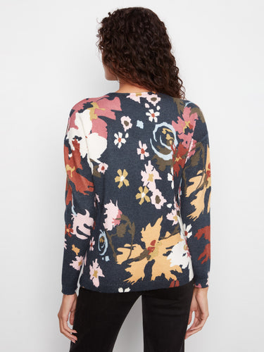 With side slits, this floral sweater ensures ease of movement and style versatility. Created by Charlie B.