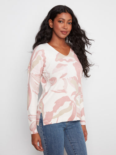 Designed with a drop shoulder style, this sweater adds a touch of relaxed sophistication to your wardrobe by Charlie B.