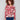 Floral print sweater with plush texture, showcasing vibrant red and pink hues in a cozy design by Charlie B.