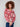 Elegant floral sweater with drop shoulders, blending red and pink tones beautifully by Charlie B.
