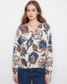 Floral blouse with a relaxed fit, featuring a vibrant print and elastic cuffs by Charlie B.