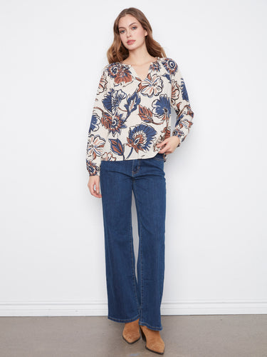 Ikat-inspired floral printed blouse in relaxed fit with elastic cuffs for comfort by Charlie B.