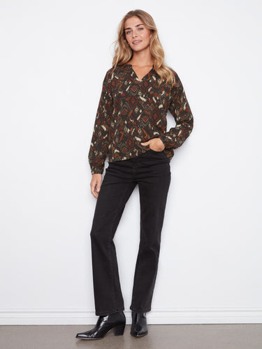 Enjoy the relaxed fit of this top, offering both comfort and a chic look for everyday wear. Designed thoughtfully by Charlie B.