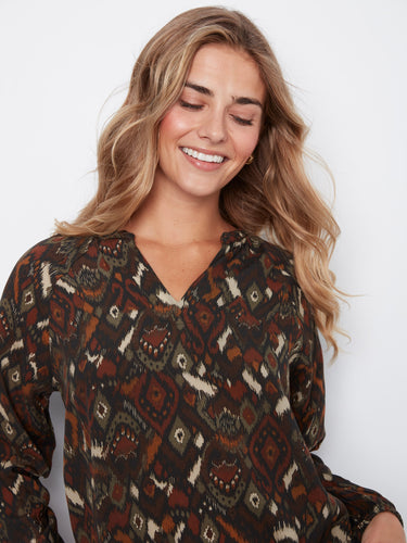 Crafted from soft viscose fabric, this top ensures all-day comfort without compromising on style. A quality piece by Charlie B.