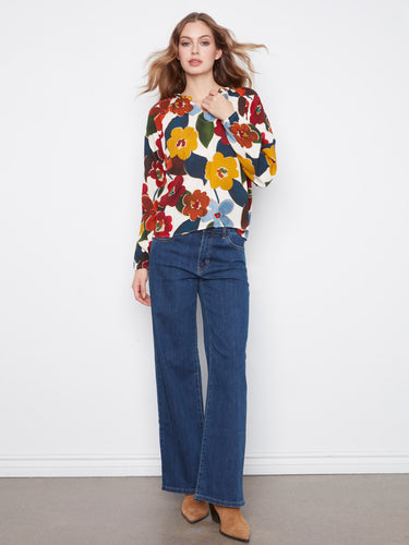 Stylish floral top with relaxed fit, showcasing a colorful pattern. Made from soft viscose fabric for comfort by Charlie B.