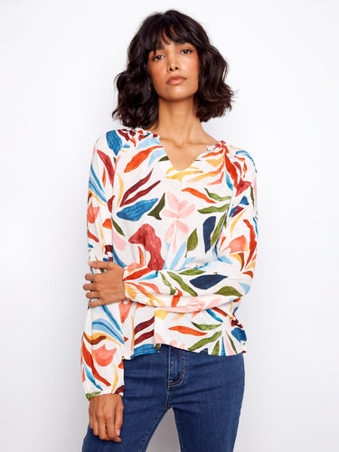 Elegant blouse featuring braided collar detail in vivid hues, ideal for enhancing your wardrobe. By Charlie B.