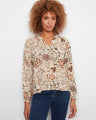 Floral blouse with a stylish notch neckline, crafted from soft viscose fabric for ultimate comfort. By Charlie B.