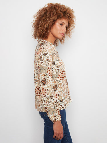 Chic floral blouse designed in a relaxed fit, perfect for casual outings or workdays. Crafted by Charlie B.