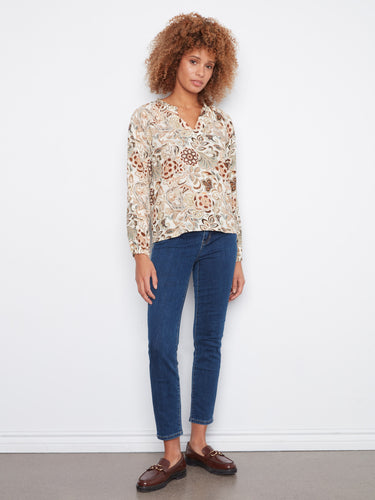 Stylish top with a notch neckline and relaxed fit, ideal for versatile wear throughout the seasons. By Charlie B.
