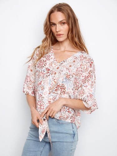 Chic popover blouse featuring a front-tie detail, adding flair to any casual ensemble by Charlie B.