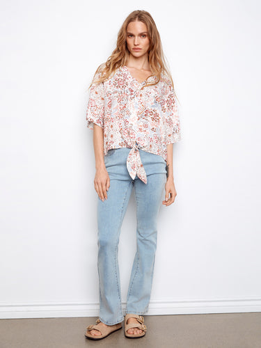 Elegant short dolman sleeves on this printed blouse offer comfort and style for everyday wear by Charlie B.