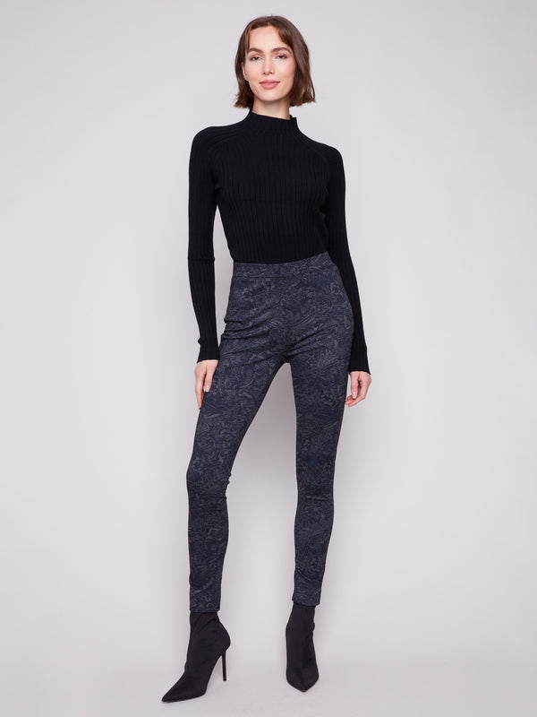 Navy slim-leg pants featuring a skinny fit and abstract print, perfect for a chic look by Charlie B.