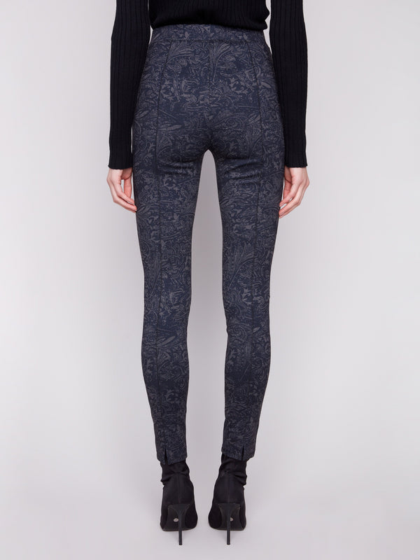 Navy slim-leg pants with slit detail at hem and abstract pattern for a trendy touch by Charlie B.